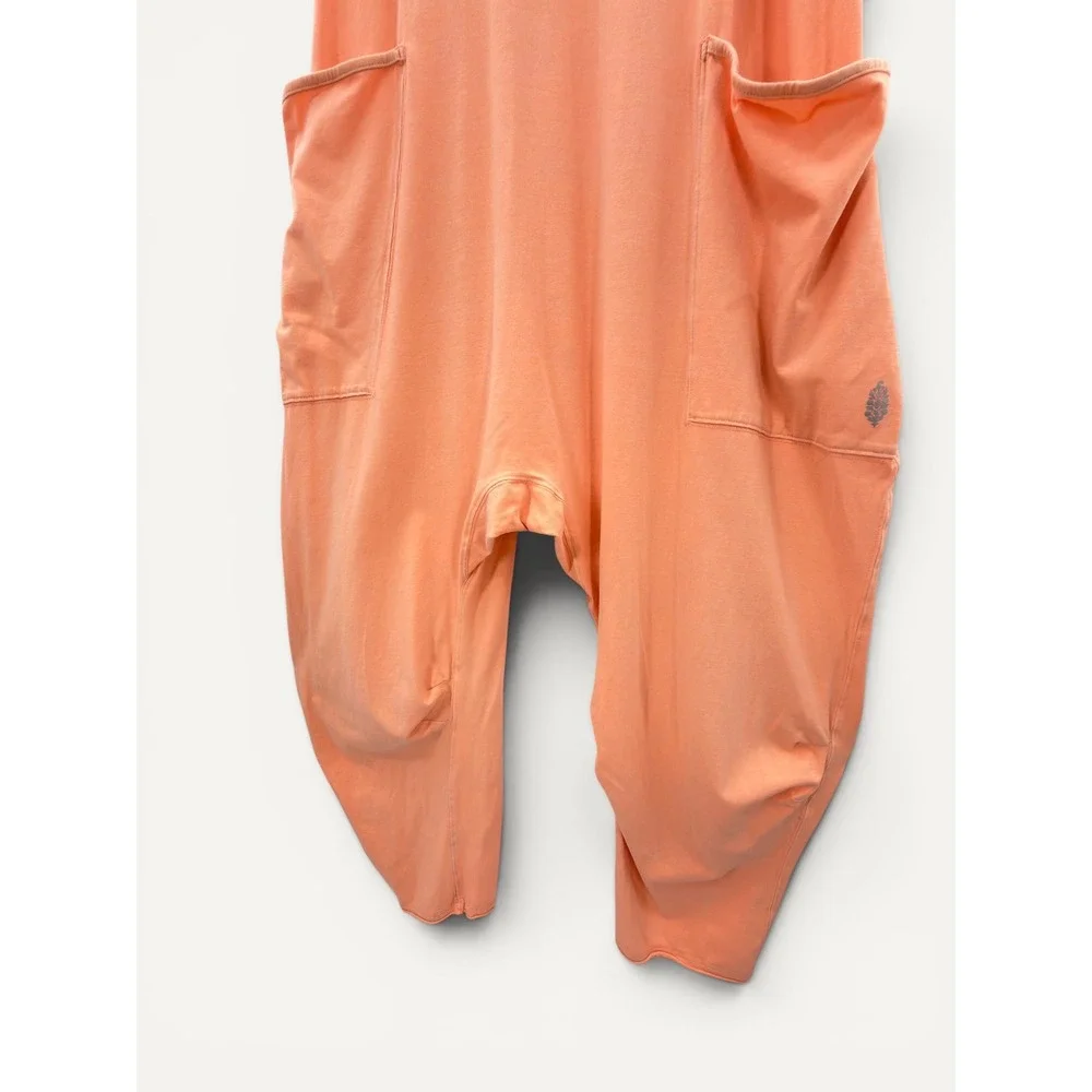 FP Movement Hot Shot Jumpsuit M Peach Boho Romper Pockets Racerback Yoga Comfy
